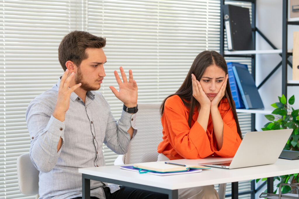 Newcastle business owner reviewing poor vs strong marketing ROI results on two campaign reports
