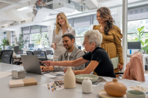 Newcastle small business team collaborating on blog content strategy in a bright office setting