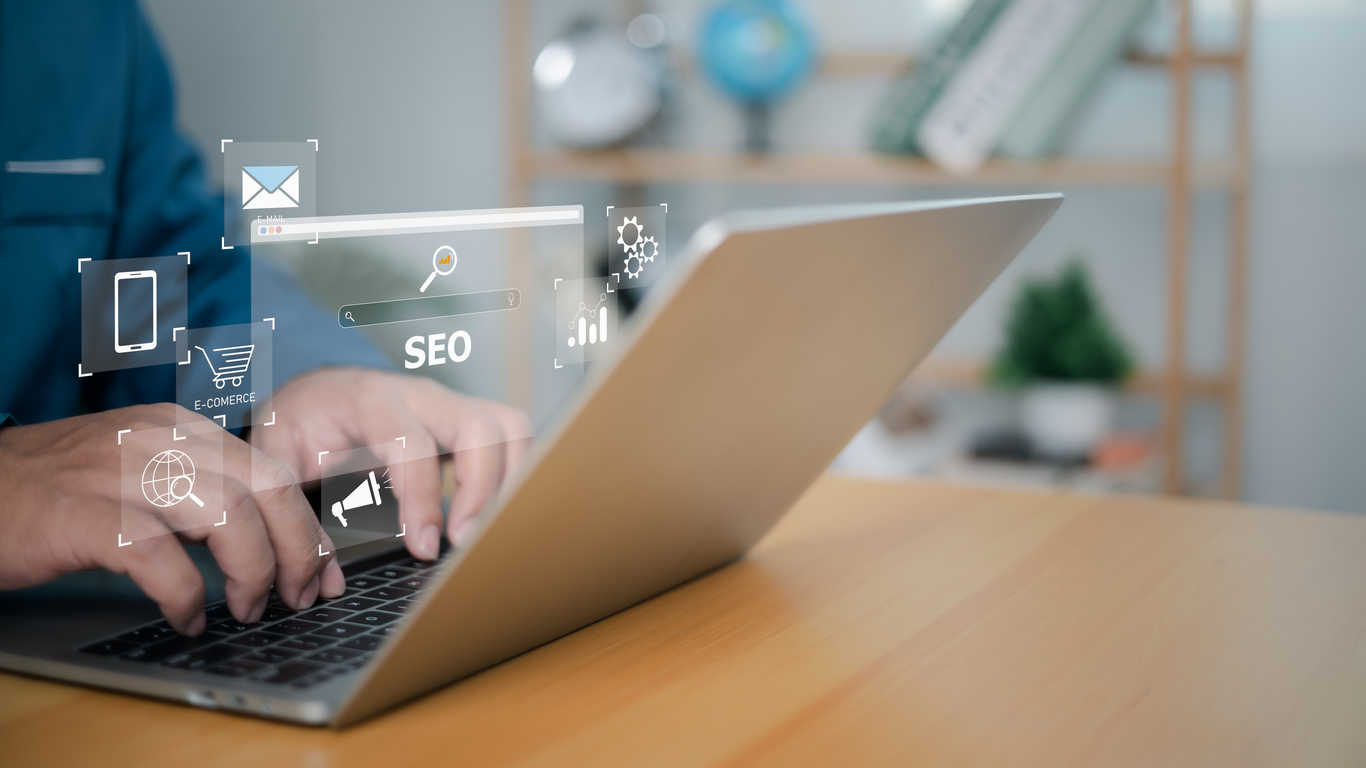 Newcastle SME owner evaluating SEO and Google Ads strategies on laptop