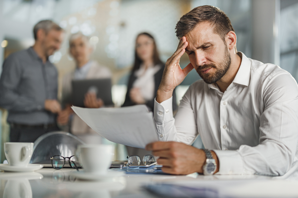 Newcastle business owner reviewing low-performing marketing dashboard wondering why traffic isn’t converting