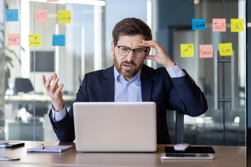Newcastle small business owner reviewing poor-performing Google Ads results.