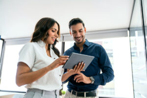 business owner reviewing website visitor journey and conversion performance