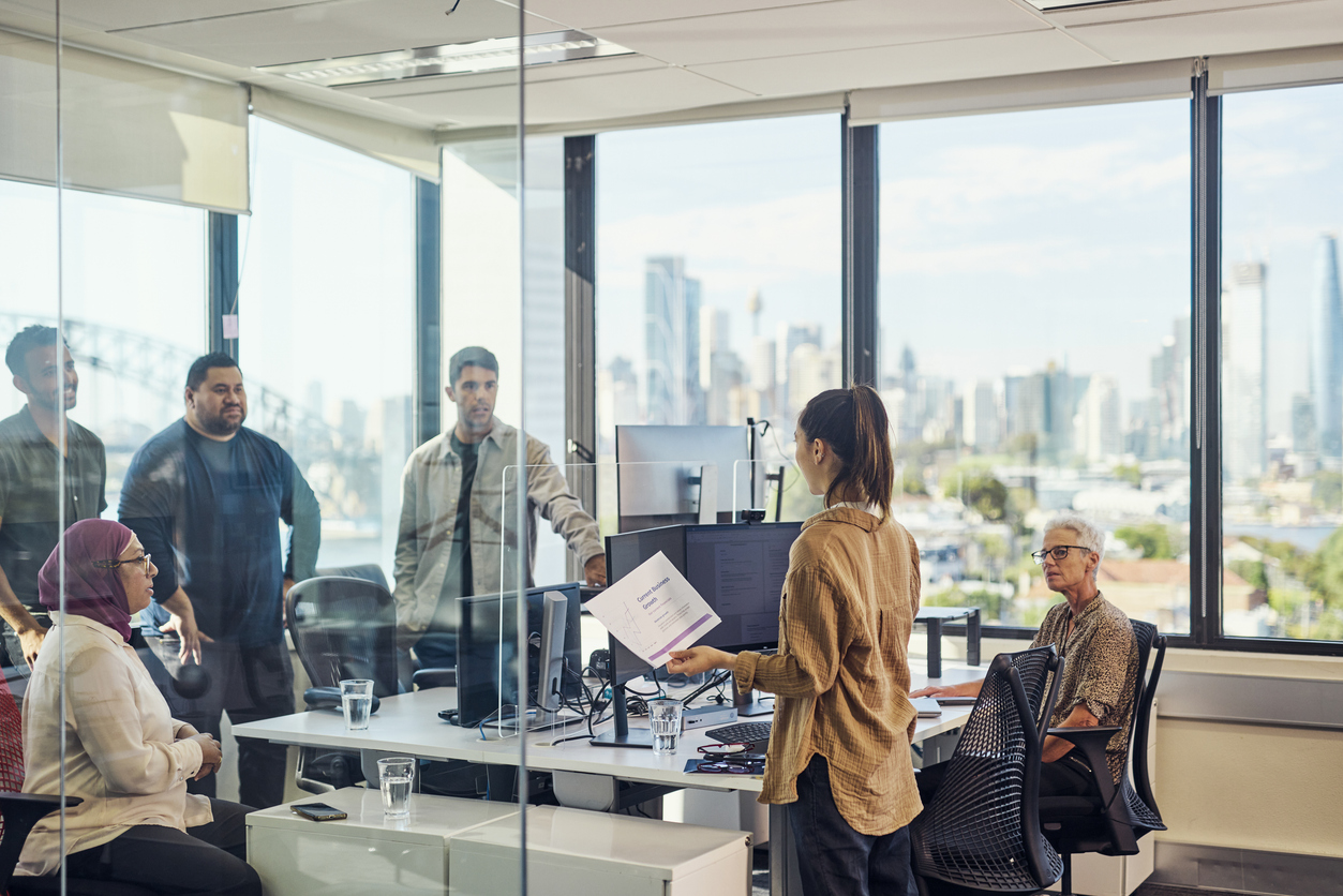 Executives viewing predictable B2B pipeline growth chart for an Australian professional services firm